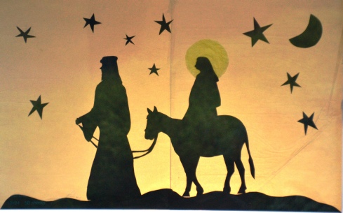Mary and Joseph travelling to Bethlehem              Silhouette (C) Helen Grubb
